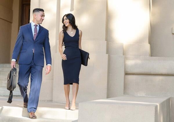 Grad students on stairs of Anderson Hall, UCR School of Business